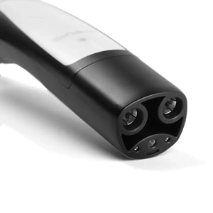 Close-up of a black and white cylindrical device on a white background