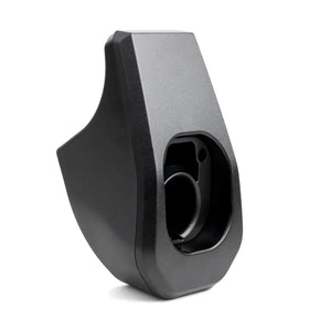 Black plastic component on a white background