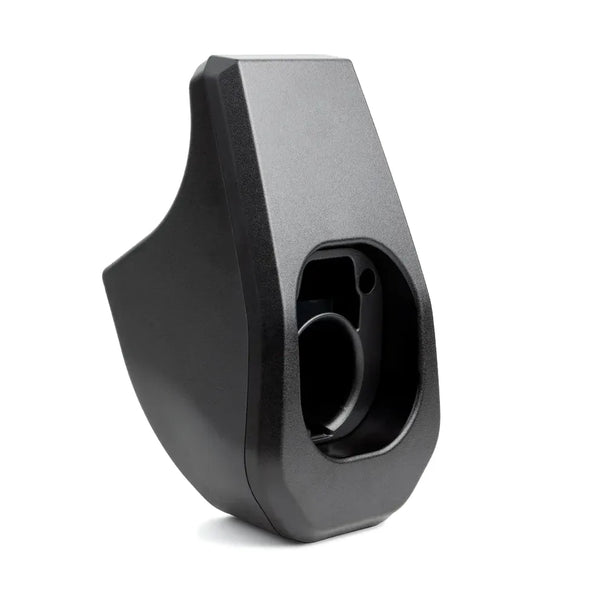 Black plastic component on a white background