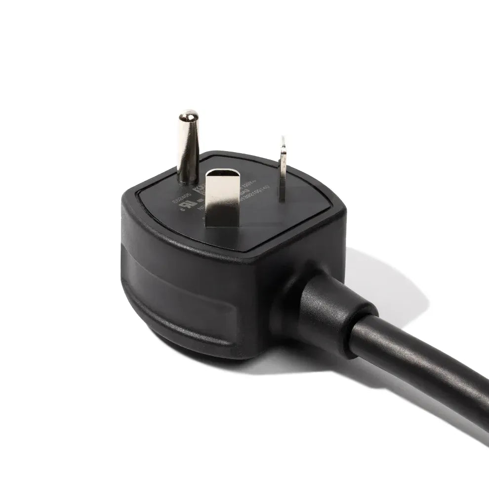 Black electrical plug on a white background