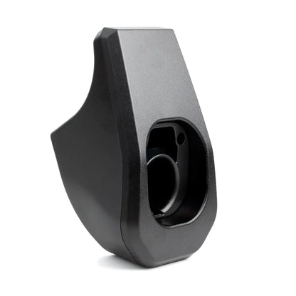 Black plastic component on a white background